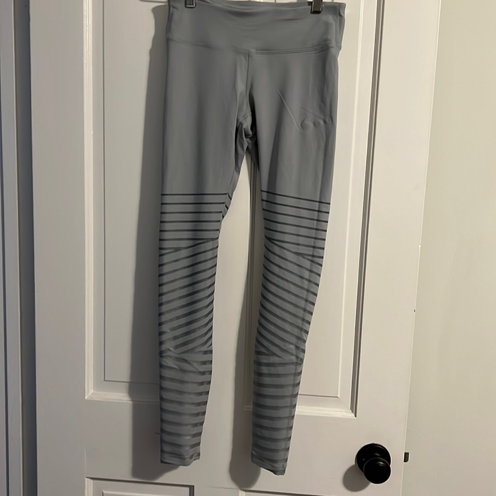 Nike light grey and stripped silver leggings